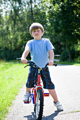 Fototapeta na wymiar boy with a bicycle