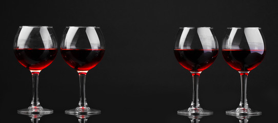 Wineglasses isolated on black