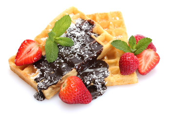 belgium waffles with strawberries and mint  isolated on white