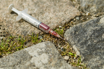 Syringe just used by a drug addict
