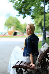 young woman in a blue dress