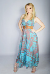 beautiful girl blonde in year bright peasant woman's dress in as