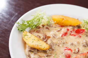meat with sauce and vegetables