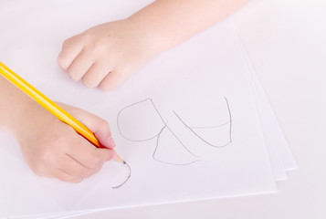 preschooler learning to write alphabet