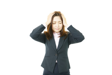 困惑した表情のオフィスレディー