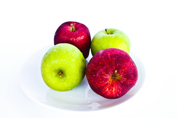 Stock Photo - red apple between green apples