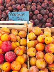 Market stall with plums