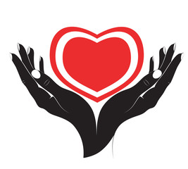 The silhouette of heart in female hands.