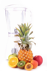 blender with assortment of fruits