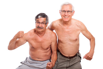 Happy naked seniors showing body