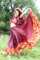 beautiful gypsy girl in red dress