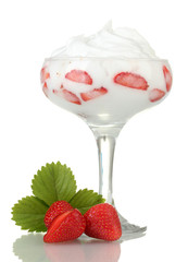 glass of ripe strawberries with cream isolated on white