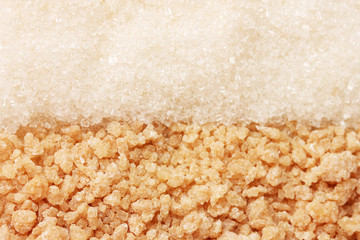 White sugar and brown sugar background closeup