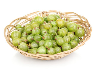 Green gooseberry in basket isolated on white