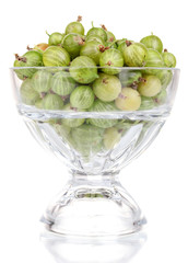 Green gooseberry in glass isolated on white