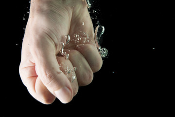 Fist with water and splash.