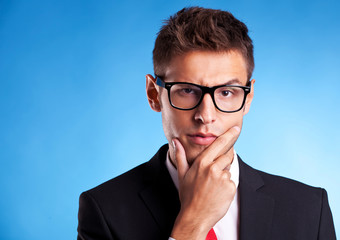 pensive young business man