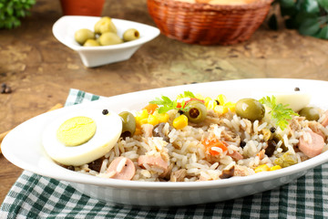 Rice salad with eggs, corn and olives