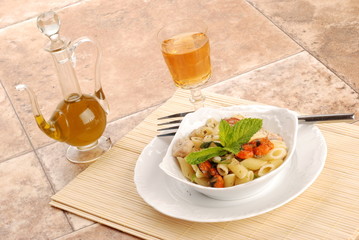 MEZZE PENNE CON CALAMARO E COZZE