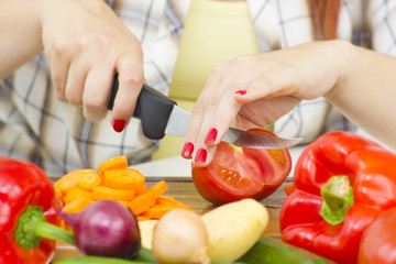 woman cutting vegetables