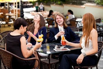 Group of friends enjoying cocktails