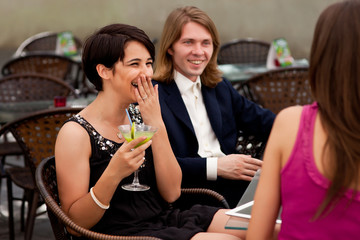 Group of friends enjoying cocktails