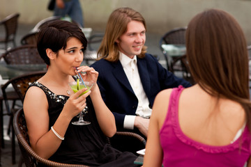 Group of friends enjoying cocktails