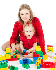 Mother and child playing together  blocks