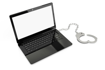 Fototapeta premium Laptop with handcuff
