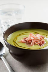bowl of vegetable soup with ham
