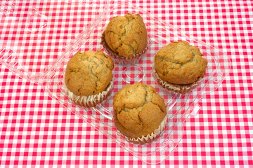 Apple spice muffins in plastic packaging