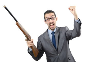Businessman with gun isolated on white