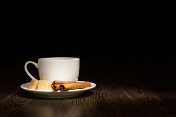 Coffee beans and white cup
