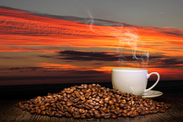 Coffee beans and white cup