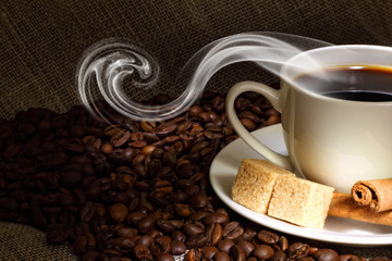 Coffee beans and white cup