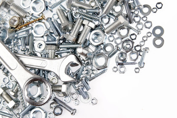 Spanners tools, nuts and bolts on white. Copy space