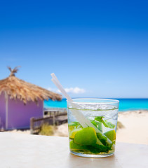 Mojito in tropical purple hut on turquoise beach