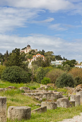 Fototapeta na wymiar Ancient agora ruins and National observatory of Athens, Greece