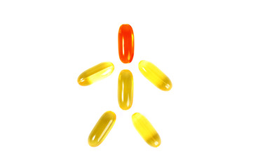 Cod liver oil omega 3 gel capsules symbolising human figure