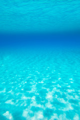 Blue turquoise underwater view of tropical beach