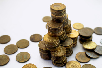 financial pyramid of ten  roubles coins on the white background