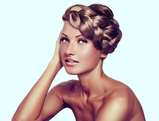 young woman with long natural mixed color braid