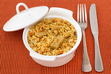 rice with pork and vegetables in the bowl