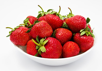 Red strawberry in the bowl closeup