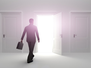 Business male choosing the entrance to an open door