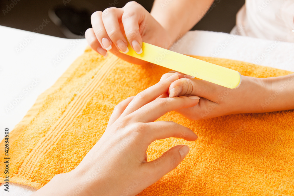 Canvas Prints manicure process on female hands