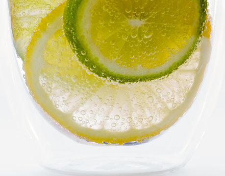 Lemon and lime in sparkling water