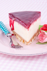 a slice of raspberry cheesecake
