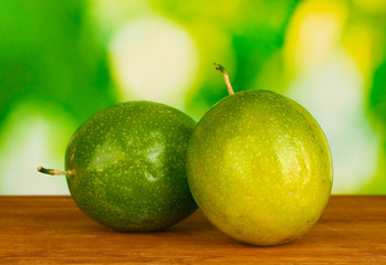 green passion fruit on green background