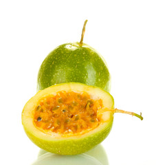 green passion fruit isolated on white background close-up